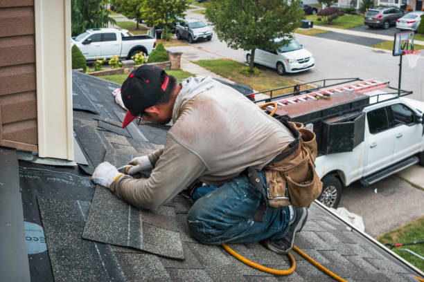 Professional Flat Roof Repair technician working in Peoria Heights, IL